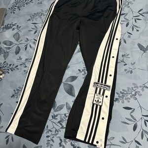 Adidas Black and White Sweatpants with Classic Stripes